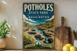 A vintage-style poster of Potholes State Park in Washington, featuring a scenic landscape with a waterfall and natural surroundings.