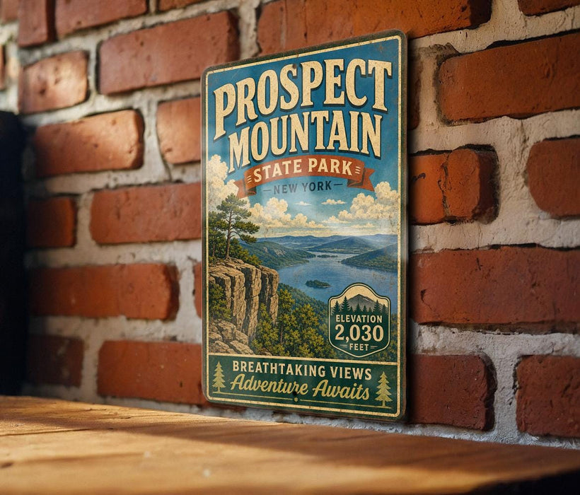 a vintage-style metal sign with a scenic mountain landscape, mounted on a brick wall.
