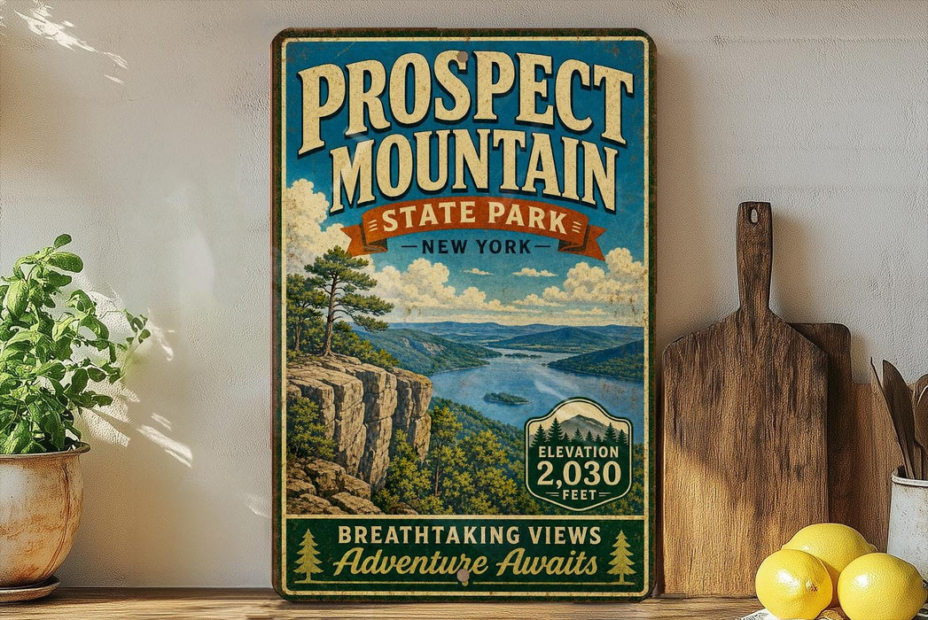 a vintage-style sign for Prospect Mountain State Park in New York, with a scenic mountain landscape and a wooden cutting board on a shelf.