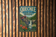 A vintage metal sign for Quechee State Park in Vermont, featuring a scenic image of a waterfall and a red wooden bridge.