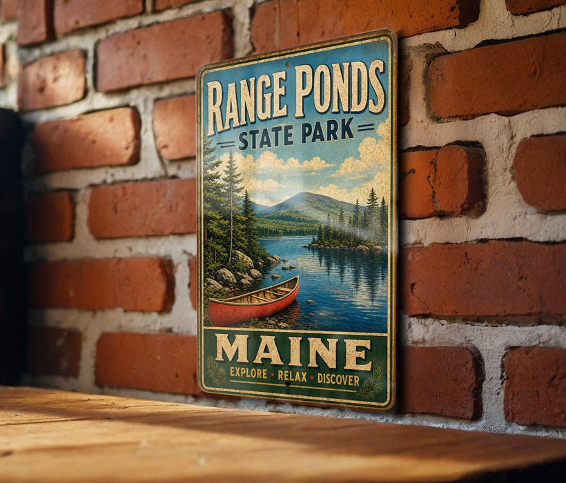 A vintage metal sign for Range Ponds State Park in Maine, featuring a scenic landscape with a canoe on a lake.