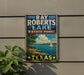A vintage-style metal sign for Ray Roberts Lake State Park in Texas, featuring a scenic landscape with a sailboat on the lake.