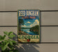 A vintage-style metal sign for Reed Bingham State Park in Georgia, featuring a scenic landscape with a lake and trees.