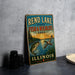 A vintage-style sign for the Rend Lake State Fish & Wildlife Area in Illinois, featuring illustrations of fish, ducks, and a sunset over a lake.