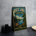 A vintage-style metal sign for Rice Lake State Park in Iowa, featuring a scenic landscape with a lake, trees, and mountains.