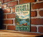 A vintage-style metal sign for Richard B. Russell State Park in Georgia, featuring a scenic illustration of a lake and mountains.