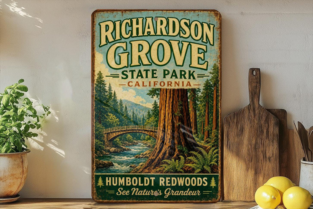A vintage-style sign for Humboldt Redwoods State Park in California, featuring a scenic illustration of a large sequoia tree and a bridge over a river.