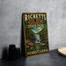 A vintage-style metal sign for Ricketts Glen State Park in Pennsylvania, featuring a waterfall and forest scenery.