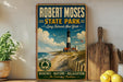 A vintage-style sign for Robert Moses State Park in Long Island, New York, featuring a lighthouse and beach scene.