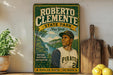 A vintage-style poster featuring a baseball player, likely Roberto Clemente, with a scenic landscape in the background.