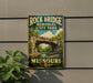 A vintage-style metal sign for Rock Bridge Memorial State Park in Missouri, featuring a scenic image of the bridge surrounded by trees and a river.