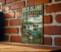 A vintage-style metal sign for Rock Island State Park in Tennessee, featuring a scenic waterfall and lush greenery.