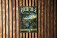 A vintage metal sign for Rockefeller State Park Preserve, featuring a scenic landscape with a bridge and trees, mounted on a wooden wall.
