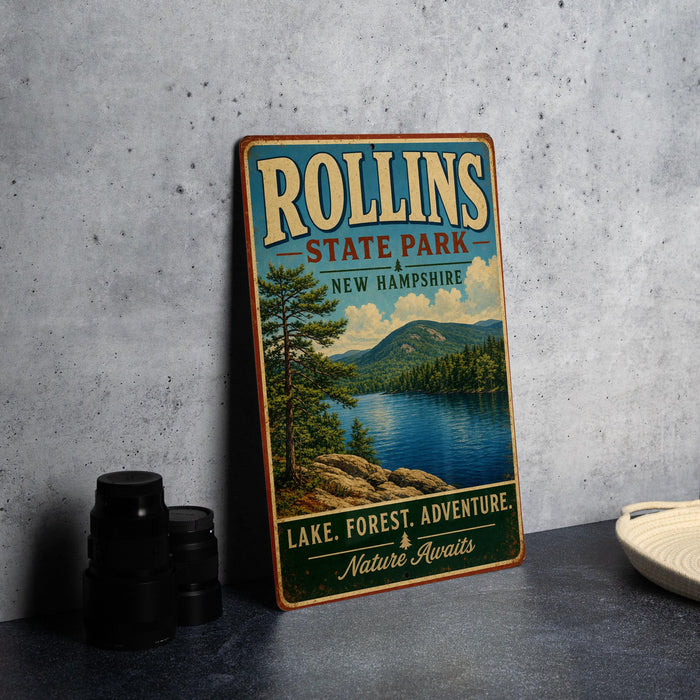 A vintage-style metal sign for Rollins State Park in New Hampshire, featuring a scenic landscape with a lake, forest, and mountains.