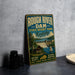 A vintage metal sign advertising Rough River Dam State Resort Park in Kentucky, featuring a scenic illustration of the dam and surrounding landscape.