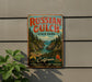 A vintage-style metal sign for Russian Gulch State Park in California, featuring a scenic landscape with a waterfall and pine trees.