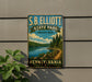 A vintage-style metal sign for S.B. Elliott State Park in Pennsylvania, featuring a scenic landscape with a lake, forest, and a winding path.