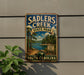 A vintage-style metal sign for Sadlers Creek State Park in South Carolina, featuring a scenic landscape with a lake and trees.