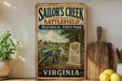 A vintage-style sign for Sailor's Creek Battlefield, a historical state park in Virginia, featuring a cannon, a gravestone, and a scenic landscape.