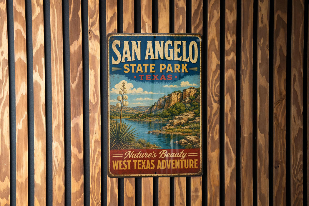 A vintage-style metal sign for San Angelo State Park in Texas, featuring a scenic landscape with a desert and a body of water.