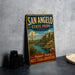 A vintage-style metal sign for San Angelo State Park in Texas, featuring a scenic landscape with a river and mountains.