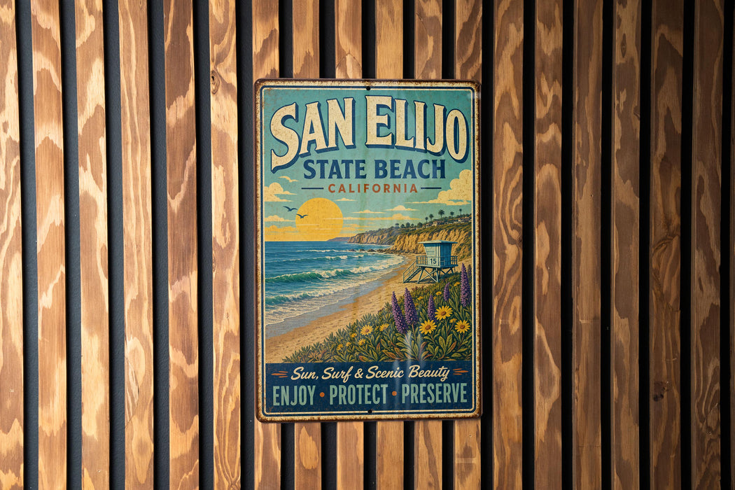 A vintage metal sign for San Elijo State Beach, California, featuring a beach scene with a lifeguard tower and a sunset over the ocean.