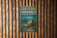 A vintage-style metal sign for San Pedro Underwater Archaeological Preserve, located in Florida.