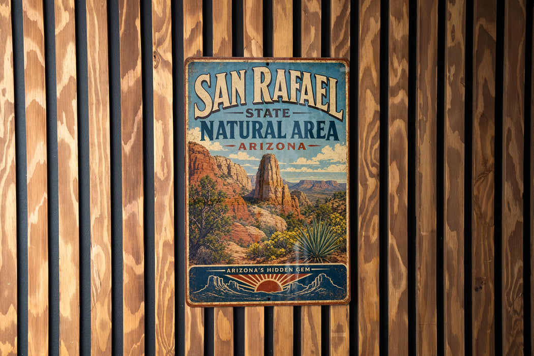 A vintage-style metal sign for San Rafael State Natural Area in Arizona, featuring a desert landscape with mountains and a prominent rock formation.