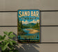 A vintage-style metal sign for Sand Bar State Park in Vermont, featuring a scenic landscape with a river and mountains.