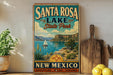 A vintage-style metal sign for Santa Rosa Lake State Park in New Mexico, featuring a scenic illustration of the lake and mountains.