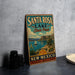 A vintage-style metal sign for Santa Rosa Lake State Park in New Mexico, featuring a scenic image of the lake and mountains.