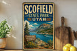 A vintage-style sign for Scofield State Park in Utah, featuring a scenic mountain landscape with a lake and a boat.