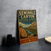 a vintage-style sign for the Seminole Canyon State Park in Texas, with a scenic illustration of the canyon and a river.