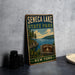 A vintage-style metal sign for Seneca Lake State Park in New York, featuring a scenic landscape with a lake, mountains, and a sailboat.
