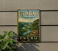 a vintage metal sign for Seven Bends State Park in Virginia, with a scenic landscape of a river and mountains in the background.