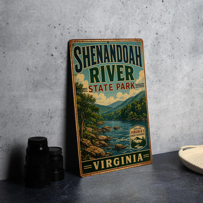 A vintage-style sign for Shenandoah River State Park in Virginia, featuring a scenic landscape with a river and mountains.