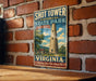 A vintage-style metal sign for Shot Tower State Park in Virginia, featuring a tall tower and a rural landscape.