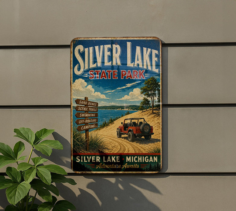 A vintage-style sign for Silver Lake State Park, featuring a scenic landscape with a red Jeep parked on a dirt road, surrounded by lush greenery.