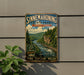 A vintage-style sign for Sinnemahoning State Park in Pennsylvania, featuring a scenic image of a river and forest.