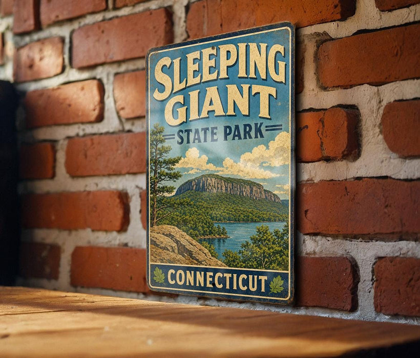 A vintage-style metal sign for Sleeping Giant State Park in Connecticut, featuring a scenic landscape with a mountain and lake.