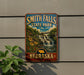 A vintage-style sign for Smith Falls State Park in Nebraska, featuring a scenic image of a waterfall surrounded by lush greenery.