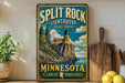 A vintage-style sign for Split Rock Lighthouse State Park in Minnesota, featuring a lighthouse on a cliff overlooking a lake.