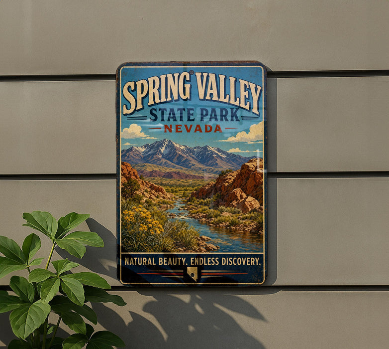 A vintage-style sign for Spring Valley State Park, Nevada, featuring a scenic landscape with mountains, a river, and desert vegetation.