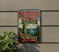 A vintage-style metal sign for Standing Stone State Park in Tennessee, featuring a scenic landscape with a tall rock formation and a lake.