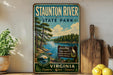 a vintage-style metal sign for Staunton River State Park, with a scenic illustration of the river and surrounding landscape.