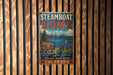 A vintage-style metal sign for Steamboat Lake State Park, featuring a scenic landscape with mountains, a lake, and a sign that says "Colorado Parks & Wildlife".