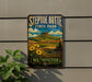 A vintage-style metal sign for Steptoe Butte State Park in Washington, featuring a landscape with a mountain, sunflowers, and a pine tree.