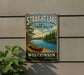 A vintage-style metal sign for Straight Lake State Park in Wisconsin, featuring a scenic image of a lake with a canoe and pine trees.