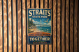 A vintage metal sign for Straits State Park, featuring a scenic illustration of lakes Huron and Michigan coming together.