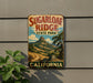A vintage-style metal sign for Sugarloaf Ridge State Park in California, featuring a scenic mountain landscape.